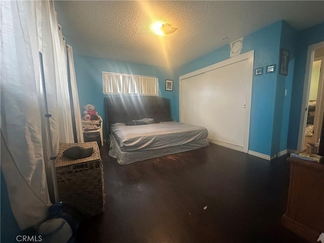 bedroom featuring a textured ceiling