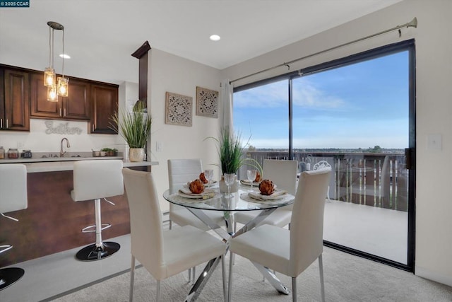 dining space featuring sink