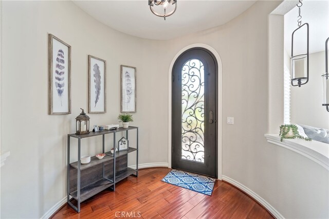 foyer entrance featuring hardwood / wood-style floors