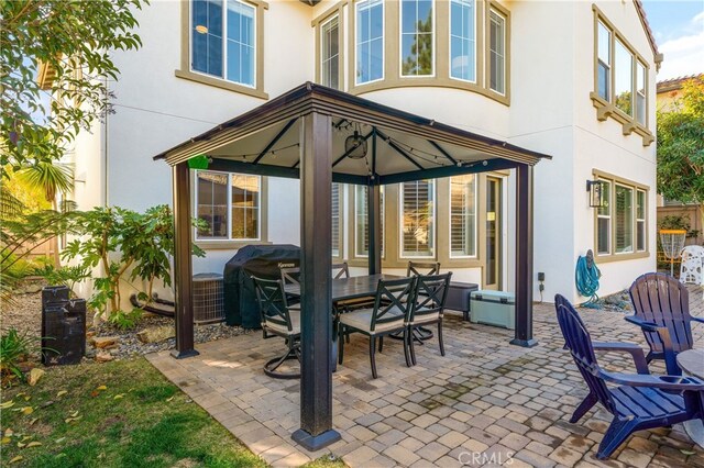 view of patio / terrace with a gazebo and area for grilling