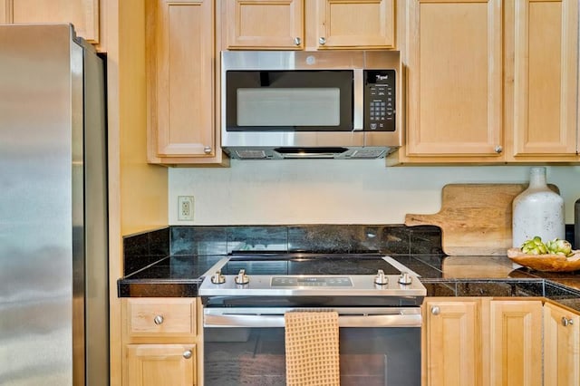 kitchen featuring appliances with stainless steel finishes and light brown cabinets