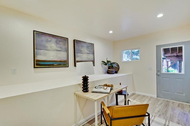 foyer entrance with light wood-type flooring