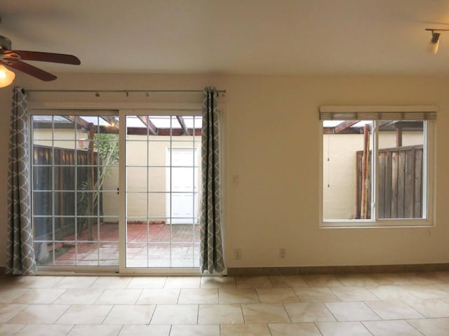 spare room featuring ceiling fan