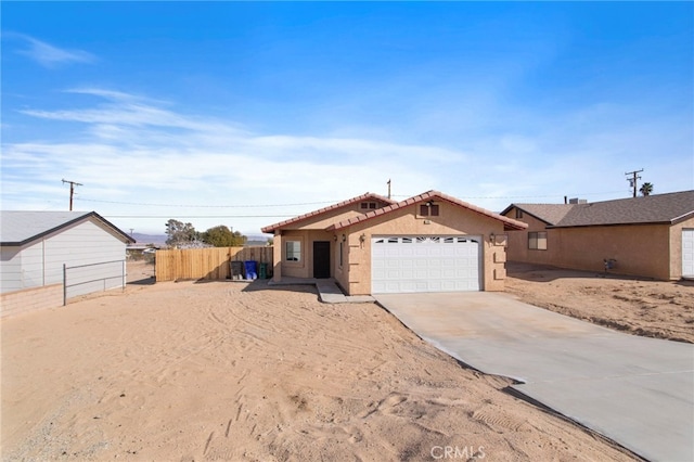 single story home with a garage