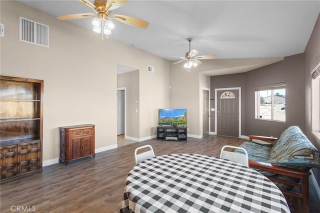 living room with ceiling fan and dark hardwood / wood-style flooring