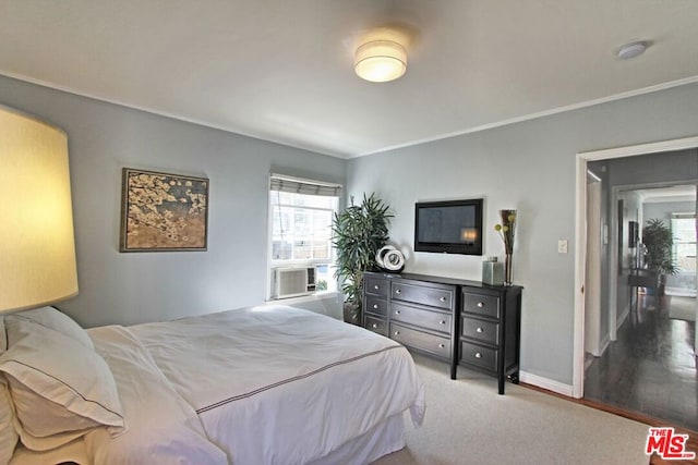 carpeted bedroom with cooling unit and crown molding