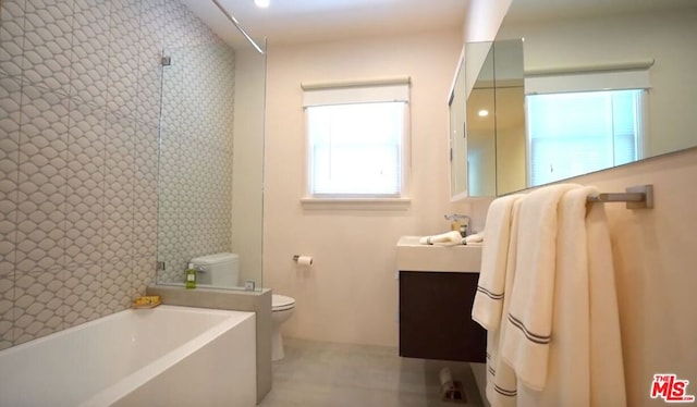 full bathroom featuring vanity, independent shower and bath, and toilet