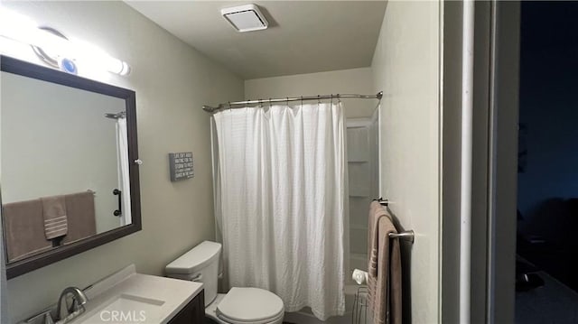 full bathroom with shower / tub combo, visible vents, vanity, and toilet