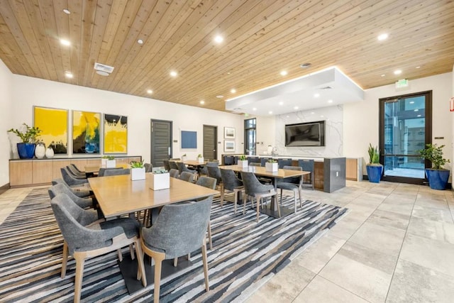 dining area with wooden ceiling