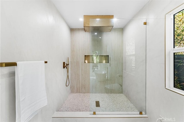 bathroom featuring a walk in shower