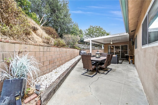 view of patio / terrace with a fenced backyard and outdoor dining area