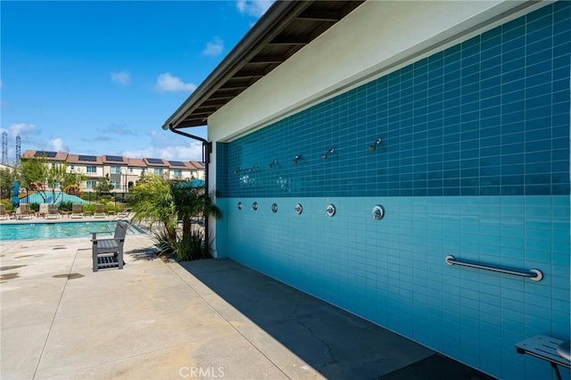 exterior space featuring a community pool