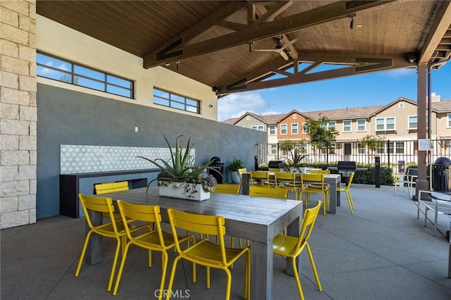 view of patio / terrace featuring a gazebo and ceiling fan