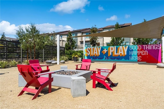 exterior space with an outdoor fire pit