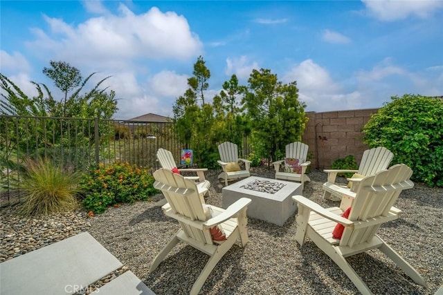 view of patio / terrace with a fire pit