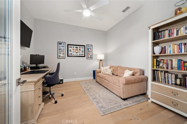 office featuring ceiling fan and light hardwood / wood-style floors