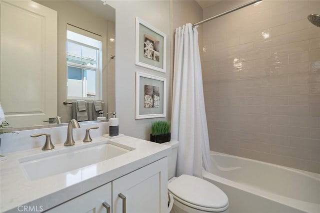 full bathroom featuring vanity, toilet, and shower / bath combo with shower curtain