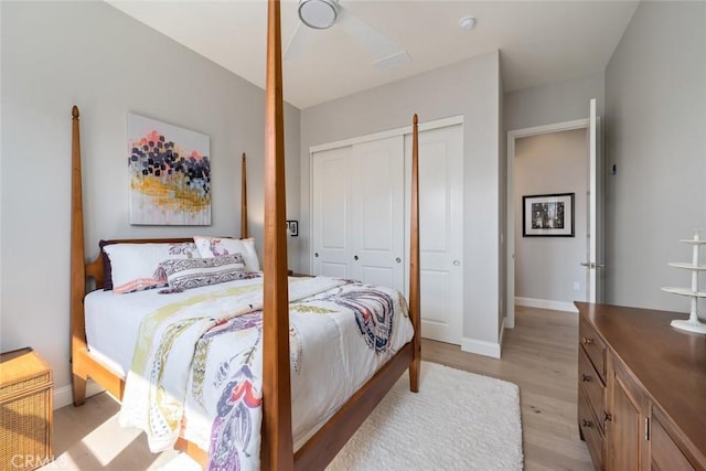 bedroom featuring a closet and light hardwood / wood-style flooring