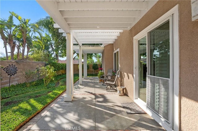 view of patio featuring a pergola