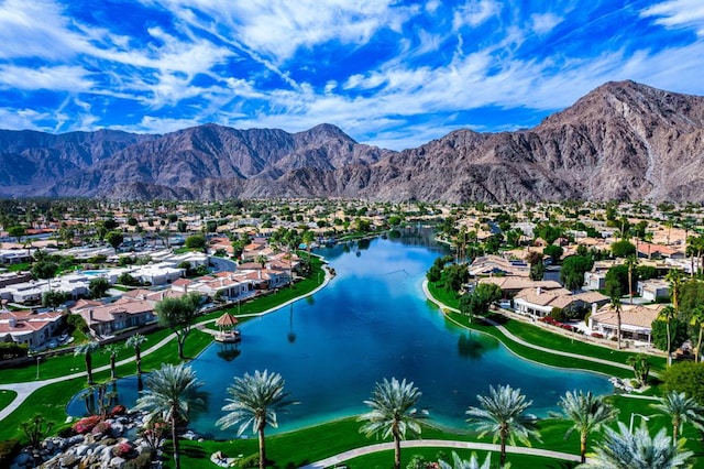 bird's eye view featuring a water and mountain view