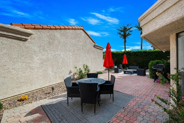 view of patio / terrace with outdoor lounge area and grilling area