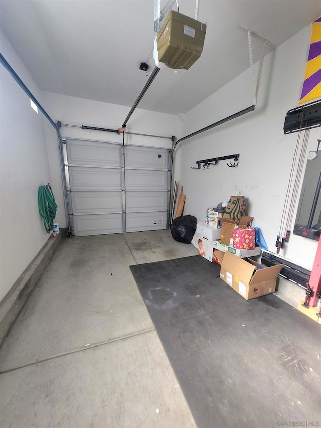 garage featuring a garage door opener