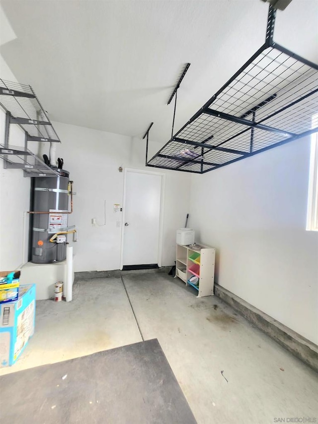 garage featuring gas water heater