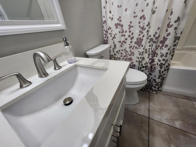 full bathroom with toilet, vanity, shower / bathtub combination with curtain, and tile patterned flooring