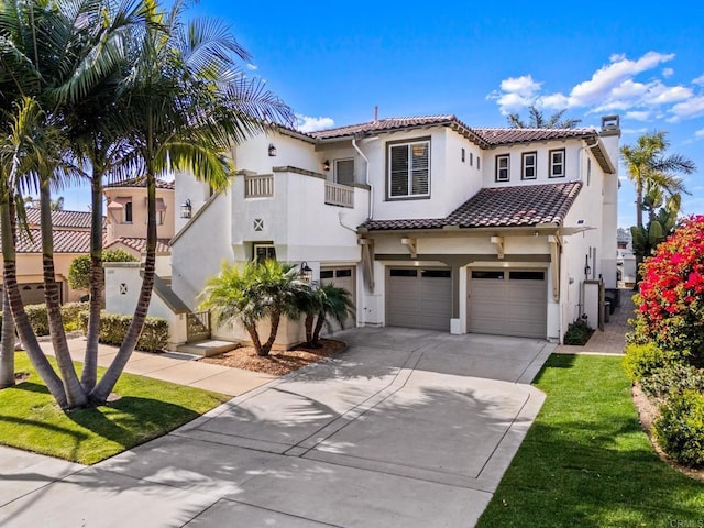 mediterranean / spanish-style home featuring a tile roof, a chimney, stucco siding, concrete driveway, and a garage