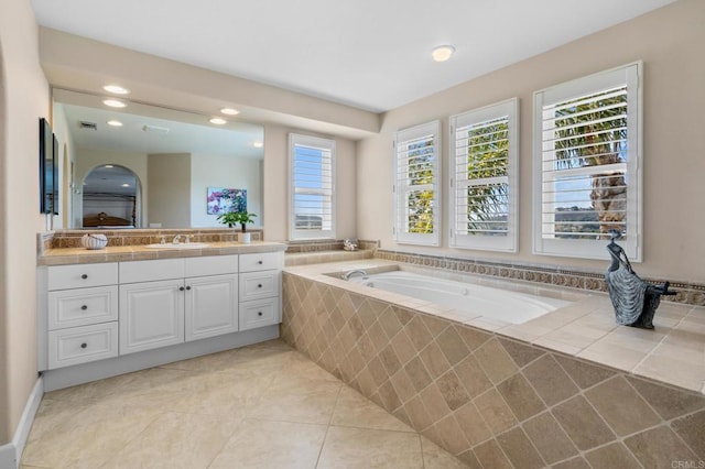 full bathroom featuring visible vents, tile patterned floors, a garden tub, vanity, and recessed lighting