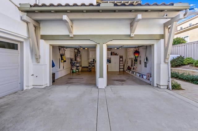 garage featuring driveway