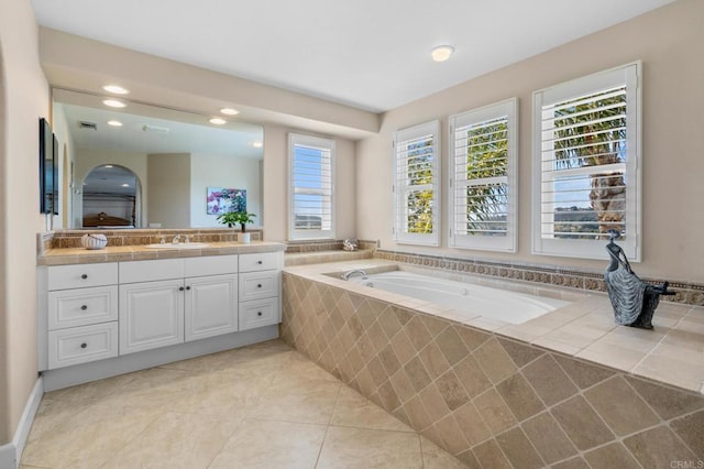 bathroom featuring a bath, visible vents, tile patterned flooring, vanity, and recessed lighting