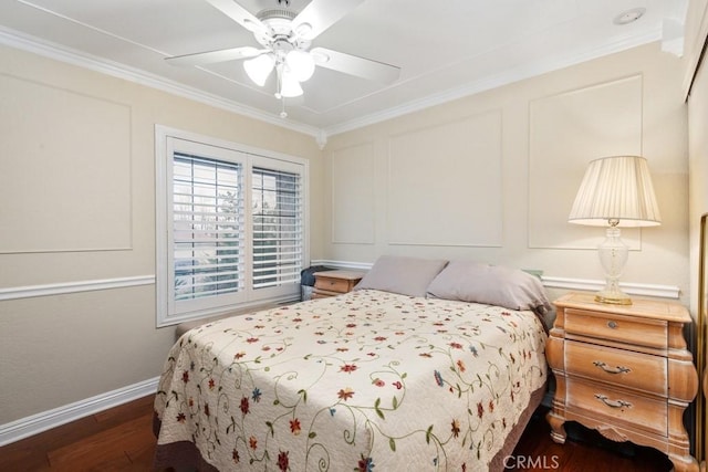 bedroom featuring crown molding, ceiling fan, and dark wood-type flooring