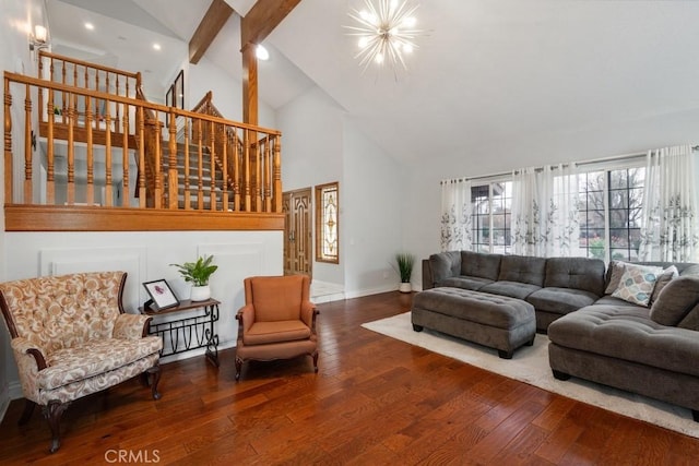 living room featuring an inviting chandelier, hardwood / wood-style floors, high vaulted ceiling, and beamed ceiling