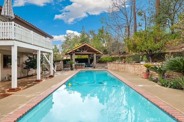 view of pool featuring a gazebo and a patio area