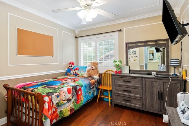 bedroom with crown molding, ceiling fan, and dark wood-type flooring