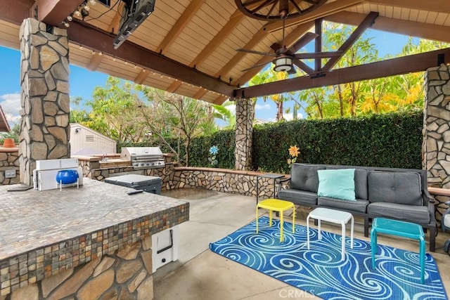 view of patio / terrace with outdoor lounge area, area for grilling, grilling area, ceiling fan, and a gazebo