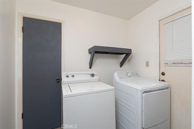 laundry area featuring washing machine and dryer