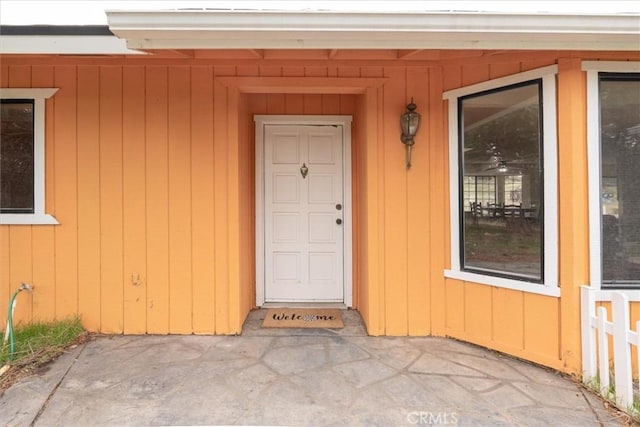 entrance to property with a patio area