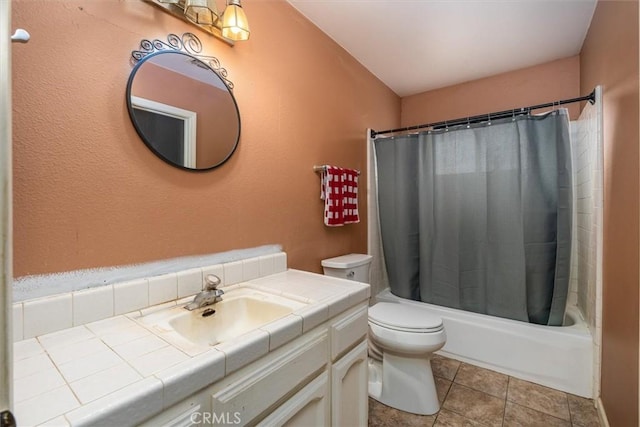 full bathroom featuring vanity, shower / tub combo, tile patterned floors, and toilet