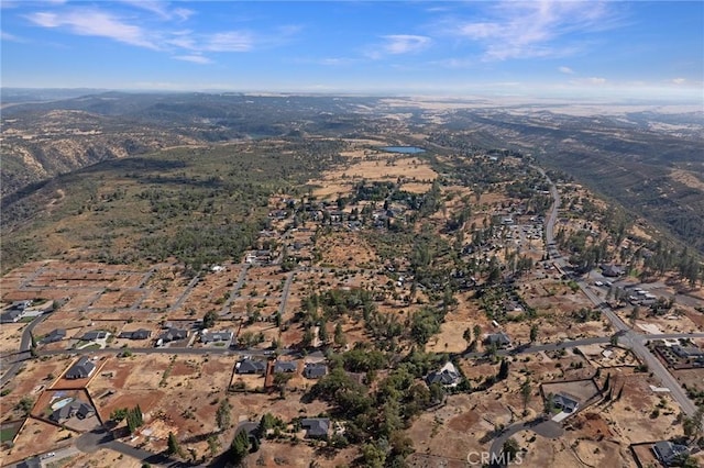 drone / aerial view featuring a mountain view