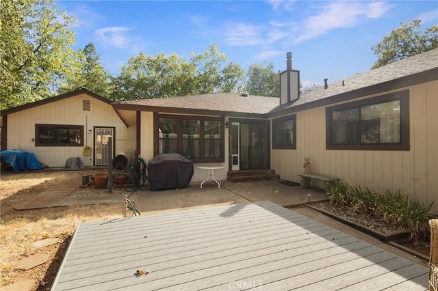 5045 Malibu Dr, Paradise, CA 95969 - wooden deck featuring area for grilling, entry steps, and a patio