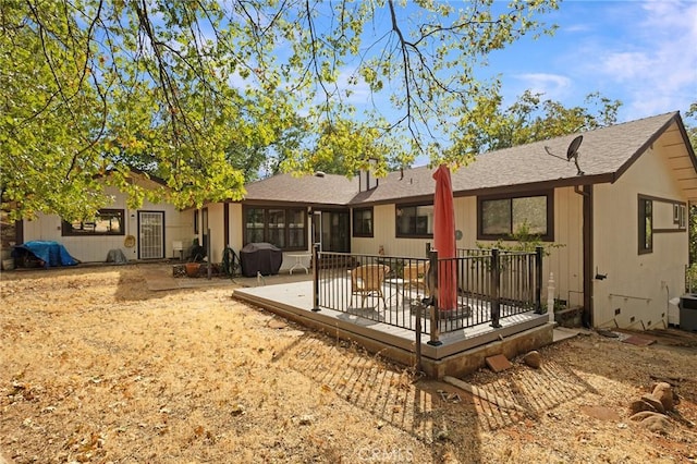 5045 Malibu Dr, Paradise, CA 95969 - back of house with a shingled roof and a deck