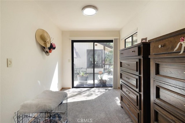 5045 Malibu Dr, Paradise, CA 95969 - doorway to outside featuring carpet flooring and baseboards