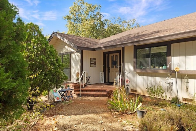 5045 Malibu Dr, Paradise, CA 95969 - property entrance featuring a porch and a shingled roof