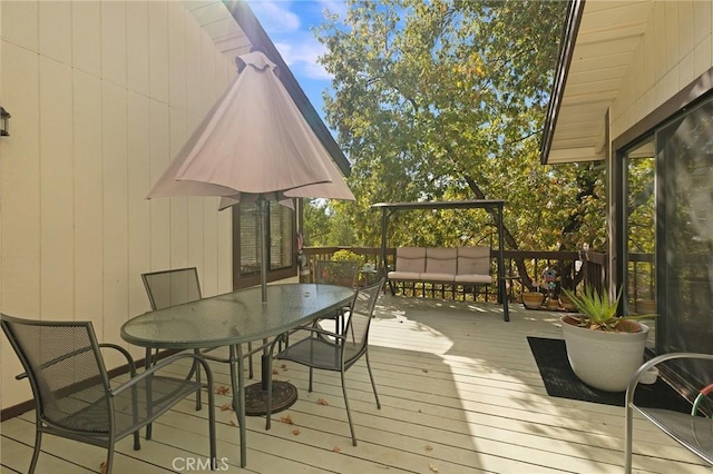 5045 Malibu Dr, Paradise, CA 95969 - wooden terrace with outdoor dining area