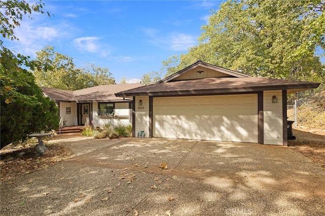 ranch-style home with a garage