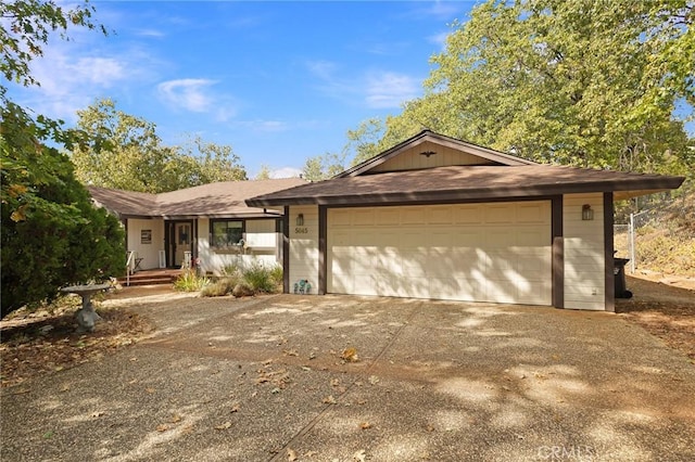 5045 Malibu Dr, Paradise, CA 95969 - single story home with an attached garage and driveway