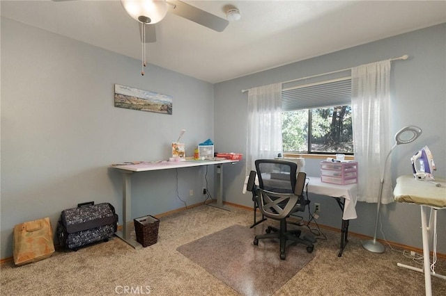 carpeted office with ceiling fan