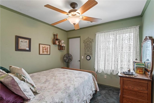 carpeted bedroom featuring ornamental molding and ceiling fan